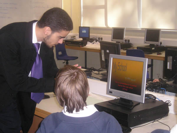 Abdul Elwakili busy supporting a young learner